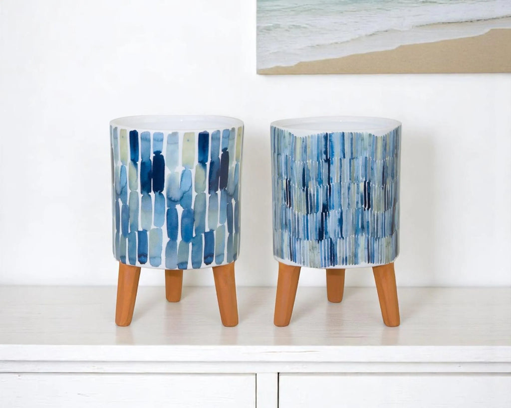 Set of Two Blue Terra Cotta And White Ceramic 2 Ounce Round Raised Pot Planters