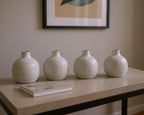 Set of Four Natural And Off White Ceramic Bud Vases With Sculptural Details